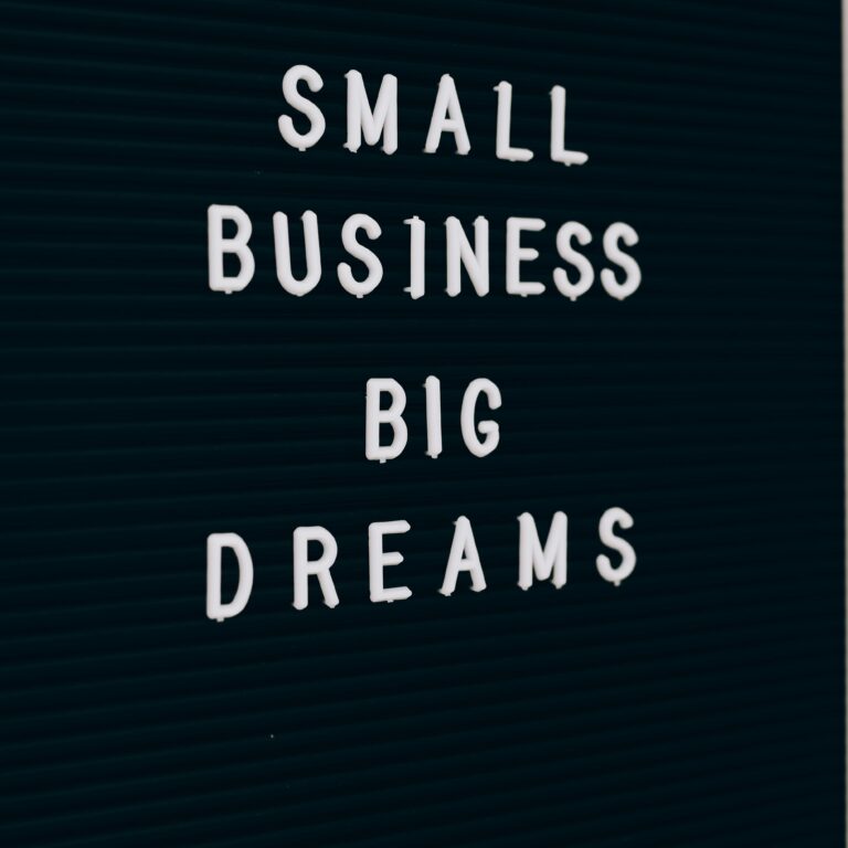 Close-up of a motivational quote about small business dreams on a letter board.